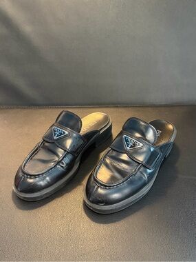 Prada Black Leather Slip-On Loafer Mules with Triangle Logo Plaque